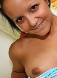 A Cute Ebony Chick Enjoys Playing Teen Porn Pix